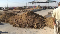 موالو حشد الشبك يقطعون طرقا ويضرمون النيران شرق الموصل